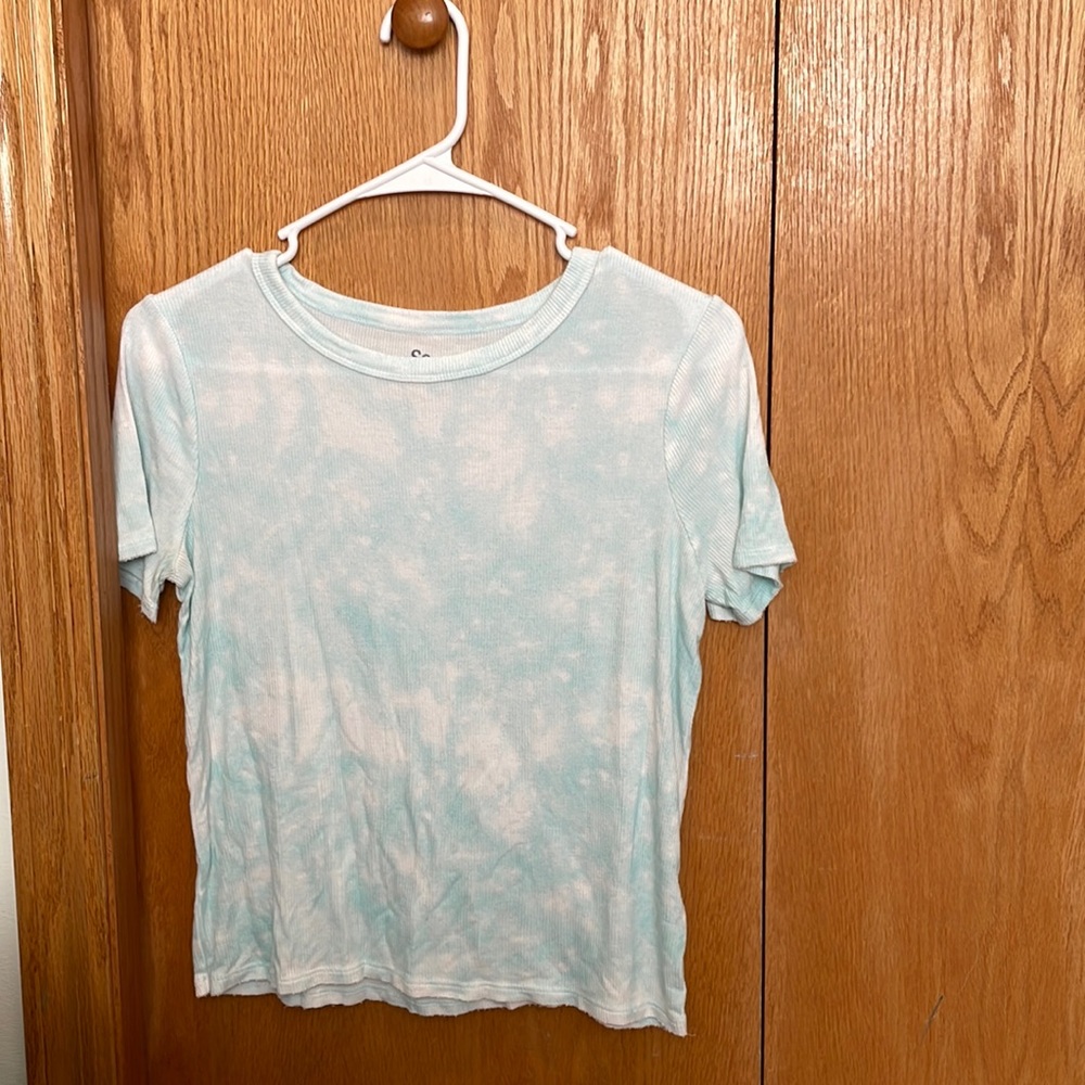 This is a blue and white tie-dye cropped/ shirt depending on your size/ height.